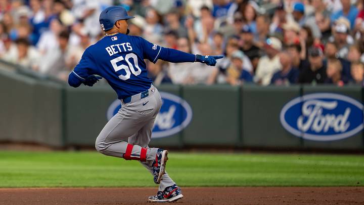 Jun 24, 2026; Minneapolis, Minnesota, USA; Los Angeles Dodgers shortstop Mookie Betts (50) celebrates hitting a solo home run against the Minnesota Twins in the first inning at Target Field. Mandatory Credit: Jesse Johnson-Imagn Images Jun 24, 2026; Minneapolis, Minnesota, USA; Los Angeles Dodgers shortstop Mookie Betts (50) celebrates hitting a solo home run against the Minnesota Twins in the first inning at Target Field. Mandatory Credit: Jesse Johnson-Imagn Images