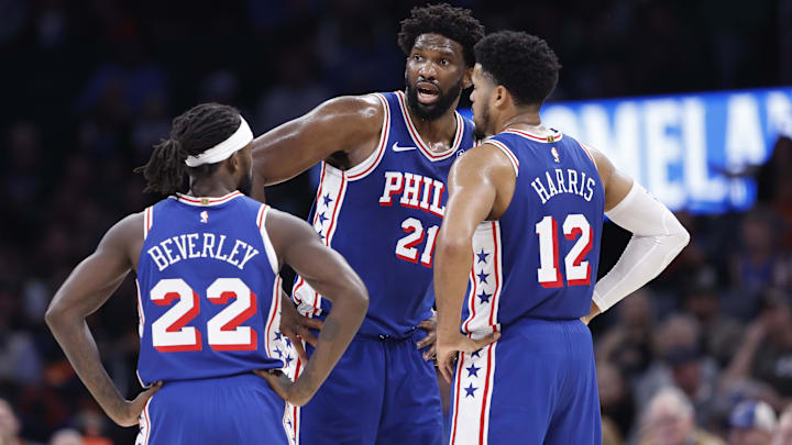 Nov 25, 2023; Oklahoma City, Oklahoma, USA; Philadelphia 76ers center Joel Embiid (21) talks to guard Patrick Beverley (22) and forward Tobias Harris (12) during a time out against the Oklahoma City Thunder during the second half at Paycom Center. Mandatory Credit: Alonzo Adams-Imagn Images