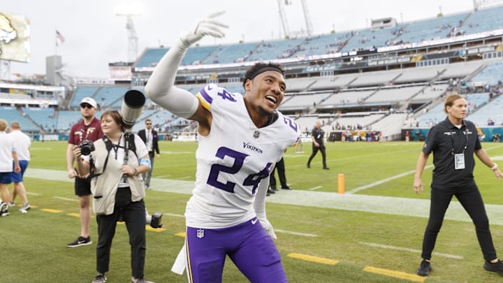 Nov 10, 2024; Jacksonville, Florida, USA; Minnesota Vikings safety Camryn Bynum (24) celebrates the win over the Jacksonville Jaguars at EverBank Stadium. Mandatory Credit: Morgan Tencza-Imagn Images