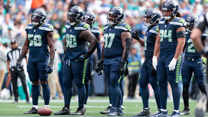 Sep 22, 2024; Seattle, Washington, USA; Seattle Seahawks defensive tackle Johnathan Hankins (97) smiles before the start of the play during the second quarter against the Miami Dolphins at Lumen Field. Mandatory Credit: Kevin Ng-Imagn Images