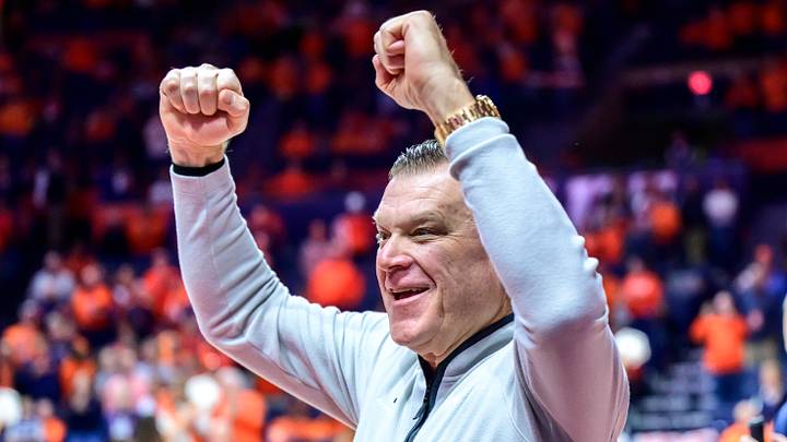 Jan 21, 2026; Champaign, Illinois, USA; Illinois Fighting Illini head coach Brad Underwood greets fans as he enters the floor during pre-game introductions at State Farm Center in a matchup against the Maryland Terrapins.. Mandatory Credit: Fred Zwicky-Imagn Images Jan 21, 2026; Champaign, Illinois, USA; Illinois Fighting Illini head coach Brad Underwood greets fans as he enters the floor during pre-game introductions at State Farm Center in a matchup against the Maryland Terrapins.. Mandatory Credit: Fred Zwicky-Imagn Images