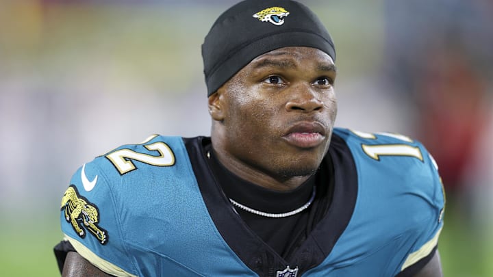 Oct 6, 2025; Jacksonville, Florida, USA; Jacksonville Jaguars wide receiver Travis Hunter (12) looks on before a game against the Kansas City Chiefs at EverBank Stadium.