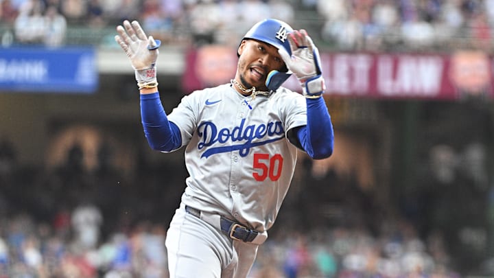 Aug 12, 2024; Milwaukee, Wisconsin, USA; Los Angeles Dodgers right field Mookie Betts (50) rounds the bases after hitting a home run against the Milwaukee Brewers at American Family Field. Mandatory Credit: Michael McLoone-USA TODAY Sports