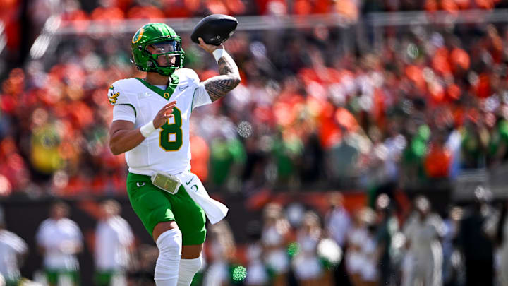 Oregon Ducks quarterback Dillon Gabriel (8) throws a touchdown pass in the first half of the annual rivalry game against the Oregon State Beavers on Saturday, Sept. 14, 2024 at Reser Stadium in Corvallis, Ore.