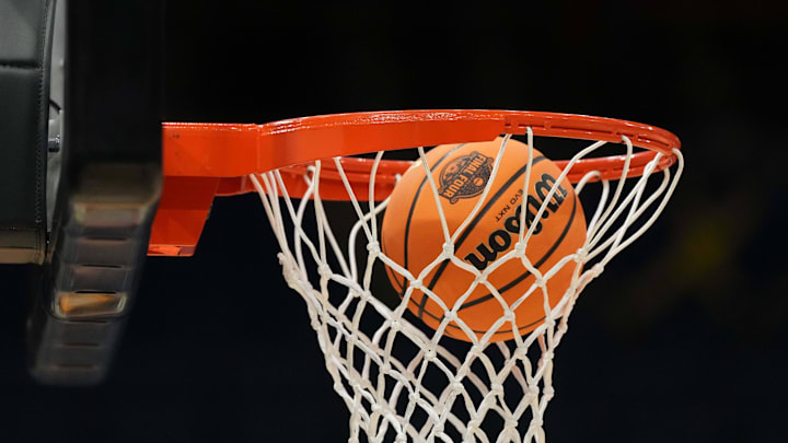 A Wilson EVO Nxt basketball ball with the 2025 NCAA Women's Final Four logo approaches the rim and the net at Amalie Arena. A Wilson EVO Nxt basketball ball with the 2025 NCAA Women's Final Four logo approaches the rim and the net at Amalie Arena.