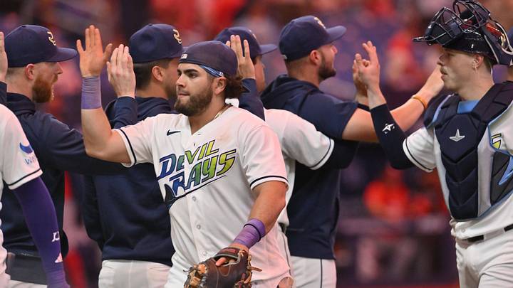 Jun 19, 2026; St. Petersburg, Florida, USA; Tampa Bay Rays teammates celebrate during the ninth inning a win against Washington Nationals at Tropicana Field. Jun 19, 2026; St. Petersburg, Florida, USA; Tampa Bay Rays teammates celebrate during the ninth inning a win against Washington Nationals at Tropicana Field.