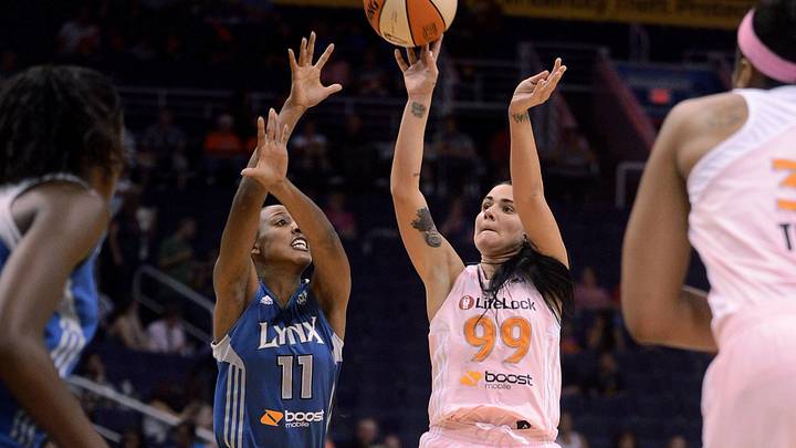 Sep. 21, 2012; Phoenix, AZ, USA; Phoenix Mercury guard Samantha Prahalis (99) puts up a shot against the Minnesota Lynx guard Candice Wiggins (11) in the first half at US Airways Center. Mandatory Credit: Jennifer Stewart-Imagn Images