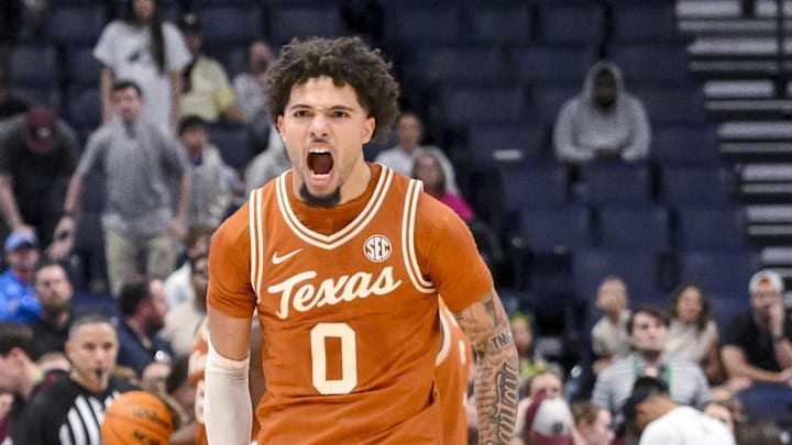 Mar 13, 2025; Nashville, TN, USA;  Texas Longhorns guard Jordan Pope (0) reacts after the double overtime win against the Texas A&M Aggies during the second half at Bridgestone Arena.