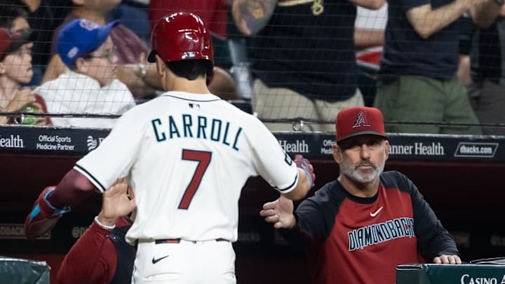 Apr 22, 2025; Phoenix, Arizona, USA; Arizona Diamondbacks outfielder Corbin Carroll (7) celebrates with manager Torey Lovullo after scoring in the eighth inning against the Tampa Bay Rays at Chase Field. Mandatory Credit: Mark J. Rebilas-Imagn Images Apr 22, 2025; Phoenix, Arizona, USA; Arizona Diamondbacks outfielder Corbin Carroll (7) celebrates with manager Torey Lovullo after scoring in the eighth inning against the Tampa Bay Rays at Chase Field. Mandatory Credit: Mark J. Rebilas-Imagn Images