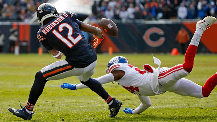 Jan 2, 2022; Chicago, Illinois, USA; New York Giants cornerback James Bradberry (24) breaks up a