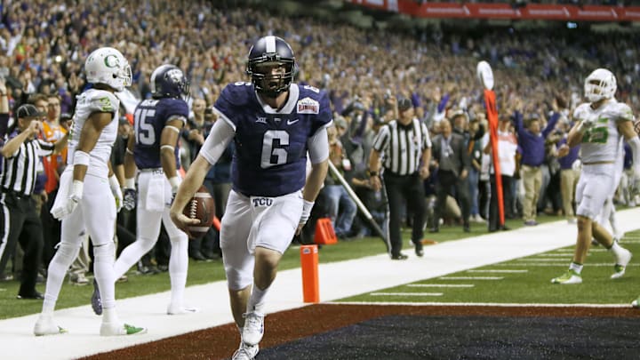 Jan 2, 2016; San Antonio, TX, USA; TCU Horned Frogs quarterback Bram Kohlhausen (6) scores the winning touchdown against the Oregon Ducks in overtime at the Valero Alamo Bowl in the Alamodome. TCU won 47-41. Mandatory Credit: Erich Schlegel-Imagn Images