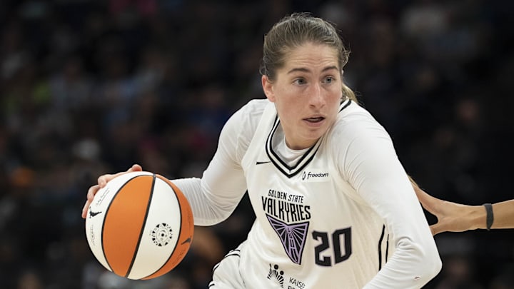 Sep 14, 2025; Minneapolis, Minnesota, USA; Golden State Valkyries guard Kate Martin (20) dribbles the ball against the Minnesota Lynx in the second half during game one of round one for the 2025 WNBA Playoffs at Target Center. Mandatory Credit: Jesse Johnson-Imagn Images