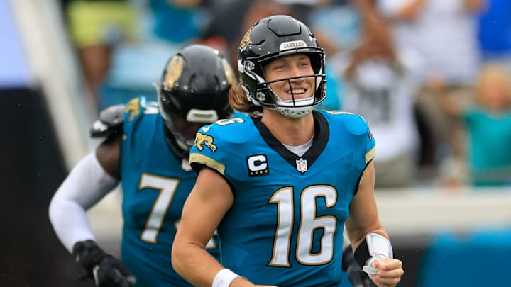 Jacksonville Jaguars quarterback Trevor Lawrence (16) reacts to a long catch and run from wide receiver Christian Kirk (13), not shown, during the fourth quarter of an NFL football matchup Sunday, Oct. 6, 2024 at EverBank Stadium in Jacksonville, Fla. The Jaguars edged the Colts on a field goal 37-34. [Corey Perrine/Florida Times-Union]