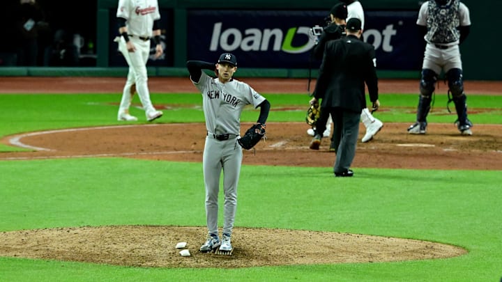 New York Yankees pitcher Luke Weaver (30) reacts