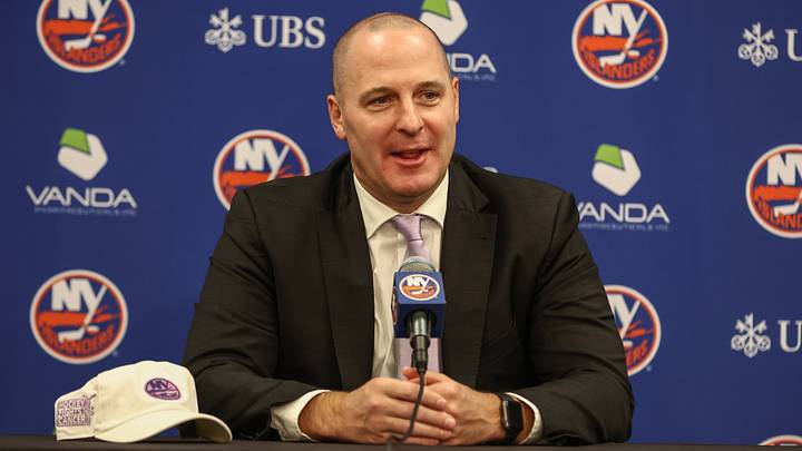 Nov 22, 2025; Elmont, New York, USA; New York Islanders General Manager Mathieu Darche speaks with fans at a pre-game event prior to the game against the St. Louis Blues at UBS Arena. Mandatory Credit: Wendell Cruz-Imagn Images