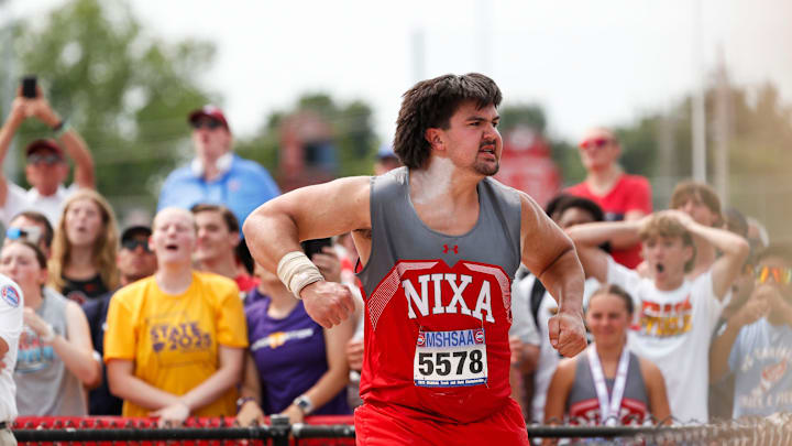 Nixa junior Jackson Cantwell celebrates after throwing a shot put 23.45 meters (76 feet, 11 ¼ inches), breaking his own Missouri high school record and finishing one centimeter behind the NFHS record during Saturday's MSHSAA state championships.