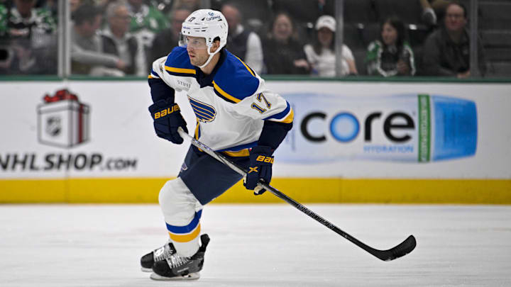 Dec 14, 2024; Dallas, Texas, USA; St. Louis Blues defenseman Cam Fowler (17) skates against the Dallas Stars during the first period at American Airlines Center. Mandatory Credit: Jerome Miron-Imagn Images