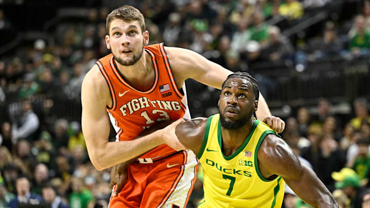 Jan 2, 2025; Eugene, Oregon, USA; Illinois Fighting Illini center Tomislav Ivisic (13) battles for rebound position with Oregon Ducks forward Supreme Cook (7) during the second half at Matthew Knight Arena. Mandatory Credit: Craig Strobeck-Imagn Images Jan 2, 2025; Eugene, Oregon, USA; Illinois Fighting Illini center Tomislav Ivisic (13) battles for rebound position with Oregon Ducks forward Supreme Cook (7) during the second half at Matthew Knight Arena. Mandatory Credit: Craig Strobeck-Imagn Images