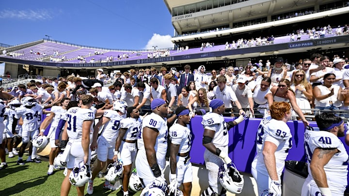Sep 20, 2025; Fort Worth, Texas, USA; The TCU Horned Frogs celebrate with the student section after the game against the SMU Mustangs at Amon G. Carter Stadium. Mandatory Credit: Jerome Miron-Imagn Images Sep 20, 2025; Fort Worth, Texas, USA; The TCU Horned Frogs celebrate with the student section after the game against the SMU Mustangs at Amon G. Carter Stadium. Mandatory Credit: Jerome Miron-Imagn Images