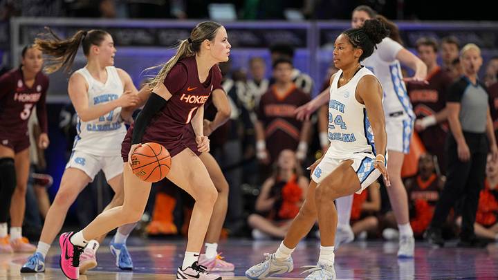 Mar 6, 2026; Duluth, Ga.; Virginia Tech guard Carleigh Wenzel (1) looks to pass against North Carolina guard Indya Nivar (24). Mar 6, 2026; Duluth, Ga.; Virginia Tech guard Carleigh Wenzel (1) looks to pass against North Carolina guard Indya Nivar (24).
