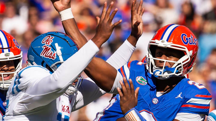 Mississippi Rebels defensive end Jared Ivey (15) pressures Florida Gators quarterback DJ Lagway (2) during the first half at Ben Hill Griffin Stadium in Gainesville, FL on Saturday, November 23, 2024. [Doug Engle/Gainesville Sun]