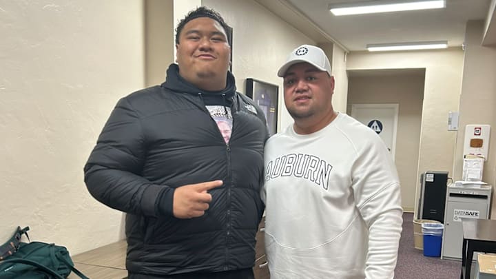 Peter Langi, Husky OL signee shown on an Auburn visit, has asked for his release. Peter Langi, Husky OL signee shown on an Auburn visit, has asked for his release.
