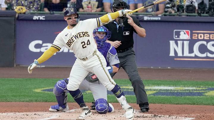 Milwaukee Brewers catcher William Contreras (24) hits an RBI during the first inning of their National League Championship Series against the Los Angeles Dodgers game at American Family Field on Oct 12, 2026. Milwaukee Brewers catcher William Contreras (24) hits an RBI during the first inning of their National League Championship Series against the Los Angeles Dodgers game at American Family Field on Oct 12, 2026.