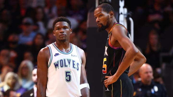 Nov 15, 2023; Phoenix, Arizona, USA; Minnesota Timberwolves guard Anthony Edwards (5) against Phoenix Suns forward Kevin Durant (35) at Footprint Center. Mandatory Credit: Mark J. Rebilas-USA TODAY Sports