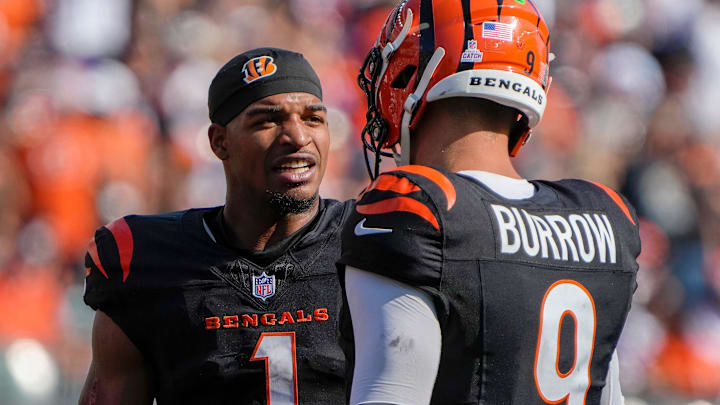 Cincinnati Bengals wide receiver Ja'Marr Chase (1) and quarterback Joe Burrow (9) talk during a timeout in Sunday, October 6, 2024, at Payor Stadium. The Bengals lost to the Baltimore Ravens 41-38 in overtime.