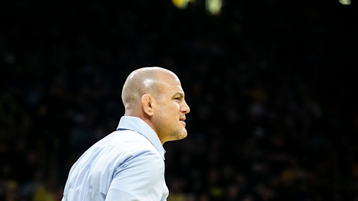 Penn State wrestling coach Cael Sanderson watches during a Big Ten Conference wrestling dual against Iowa. 