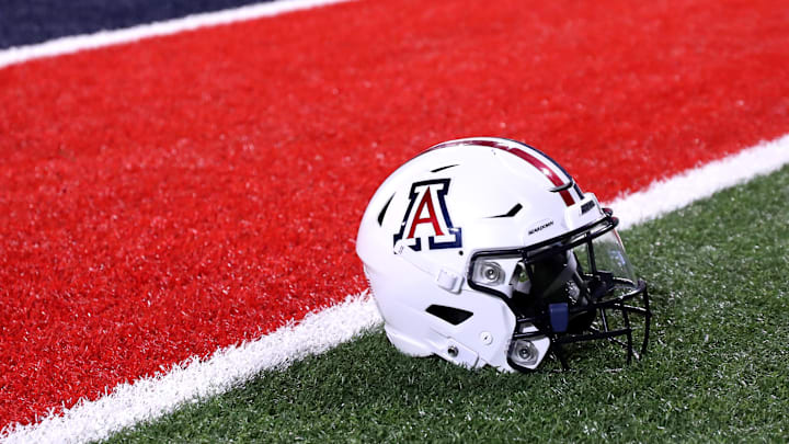 Sep 2, 2023; Tucson, Arizona, USA; Arizona Wildcats quarterback Jayden de Laura (7) helmet on the field after a victory over Northern Arizona Lumberjacks at Arizona Stadium. Mandatory Credit: Zac BonDurant-Imagn Images