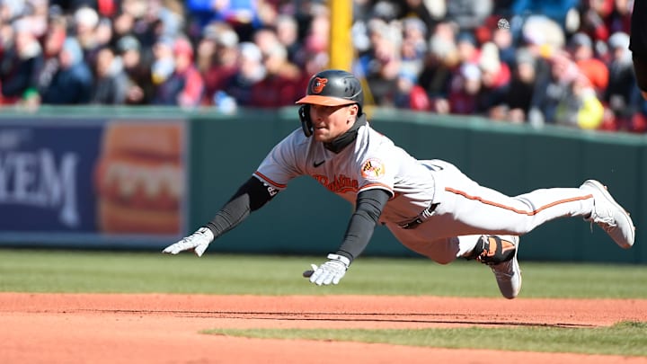 Mar 30, 2023; Boston, Massachusetts, USA; Baltimore Orioles second baseman Adam Frazier (12) dives