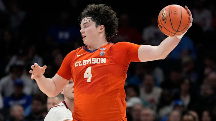 Mar 14, 2025; Charlotte, NC, USA; Clemson Tigers forward Ian Schieffelin (4) with the ball in the first half at Spectrum Center. Mar 14, 2025; Charlotte, NC, USA; Clemson Tigers forward Ian Schieffelin (4) with the ball in the first half at Spectrum Center.