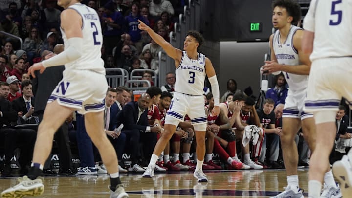 Northwestern Wildcats guard Ty Berry (3) gestures after making a three point basket against the Indiana Hoosiers during the second half at Welsh-Ryan Arena. Northwestern Wildcats guard Ty Berry (3) gestures after making a three point basket against the Indiana Hoosiers during the second half at Welsh-Ryan Arena.