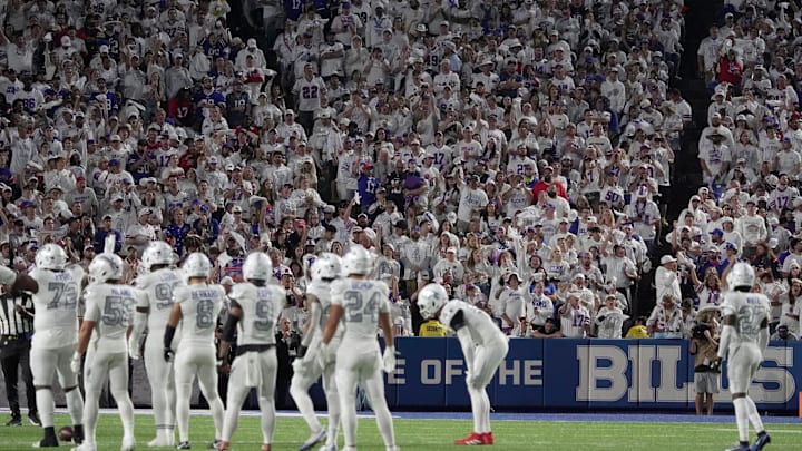 Fans were asked to wear all white for the Bills rivalry match up against the New England Patriots during first half action at Highmark Stadium in Orchard Park on Oct. 5, 2025.