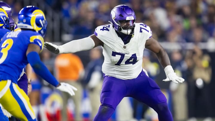 Jan 13, 2025; Glendale, AZ, USA; Minnesota Vikings tackle Cam Robinson (74) against the Los Angeles Rams during an NFC wild card game at State Farm Stadium. Jan 13, 2025; Glendale, AZ, USA; Minnesota Vikings tackle Cam Robinson (74) against the Los Angeles Rams during an NFC wild card game at State Farm Stadium.