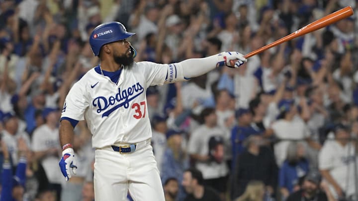 Los Angeles Dodgers outfielder Teoscar Hernandez hits a solo home run during Game 5 of a National League Divisional Series against the San Diego Padres on Friday at Dodger Stadium.