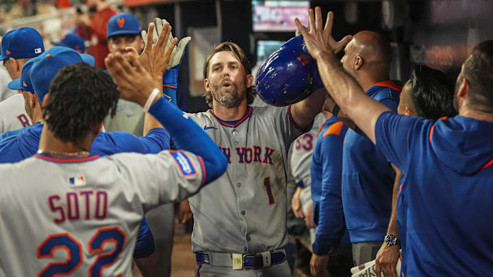 Aug 23, 2025; Cumberland, Georgia, USA; New York Mets second baseman Jeff McNeil (1) reacts after hitting a home run against the Atlanta Braves during the ninth inning at Truist Park. Mandatory Credit: Dale Zanine-Imagn Images