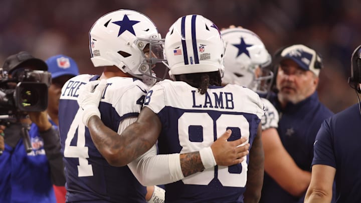Dallas Cowboys wide receiver CeeDee Lamb and quarterback Dak Prescott during the game against the Washington Commanders 
