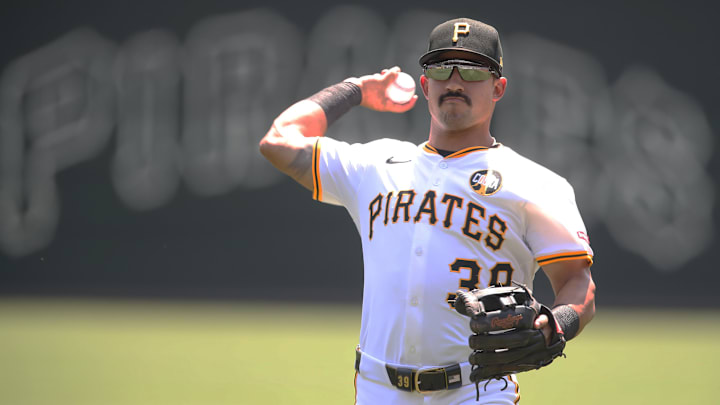 Aug 10, 2025; Pittsburgh, Pennsylvania, USA;  Pittsburgh Pirates second baseman Nick Gonzales (39) warms up before the game against the Cincinnati Reds at PNC Park. Mandatory Credit: Charles LeClaire-Imagn Images