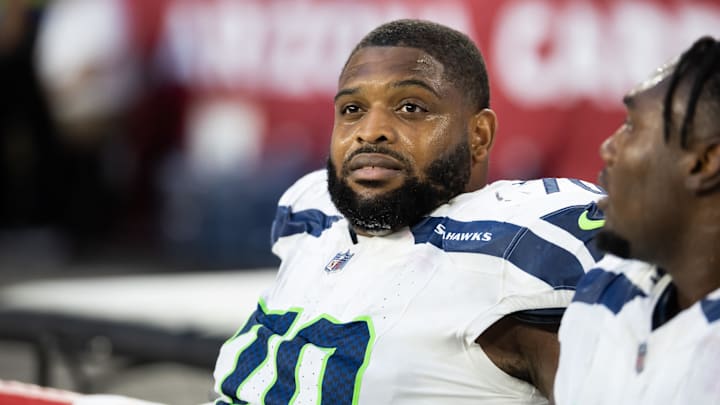 Dec 8, 2024; Glendale, Arizona, USA; Seattle Seahawks guard Laken Tomlinson (70) against the Arizona Cardinals at State Farm Stadium.