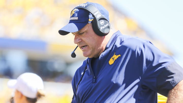 Aug 30, 2025; Morgantown, West Virginia, USA; West Virginia Mountaineers head coach Rich Rodriguez along the sidelines during the first quarter against the Robert Morris Colonials at Milan Puskar Stadium. Mandatory Credit: Ben Queen-Imagn Images
