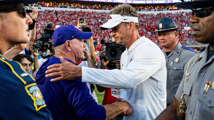 LSU head coach Brian Kelly and Ole Miss head coach Lane Kiffin shake hands after a college football game between Ole Miss and LSU at Vaught-Hemingway Stadium in Oxford, Miss., on Saturday, Sept. 27, 2025. Ole Miss defeated LSU 24-19.