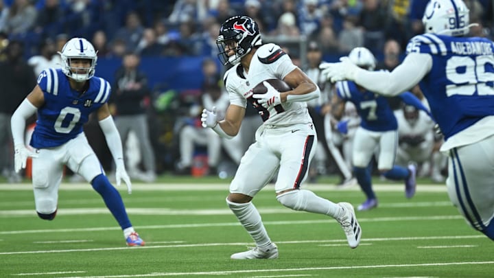 Nov 30, 2025; Indianapolis, Indiana, USA; Houston Texans wide receiver Jayden Higgins (81) runs against Indianapolis Colts safety Cam Bynum (0) during the first half at Lucas Oil Stadium. Mandatory Credit: Robert Goddin-Imagn Images