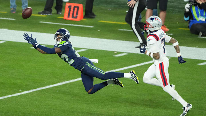 Seattle Seahawks wide receiver Rashid Shaheed (22) cannot catch a pass while defended by New England Patriots cornerback Carlton Davis III 