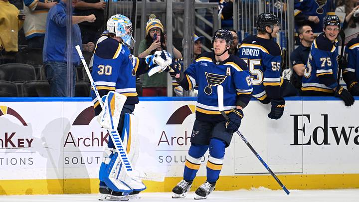 Apr 13, 2026; St. Louis, Missouri, USA; St. Louis Blues left wing Jake Neighbours (63) is congratulated after scoring against the Minnesota Wild in the third period at Enterprise Center. Mandatory Credit: Joe Puetz-Imagn Images