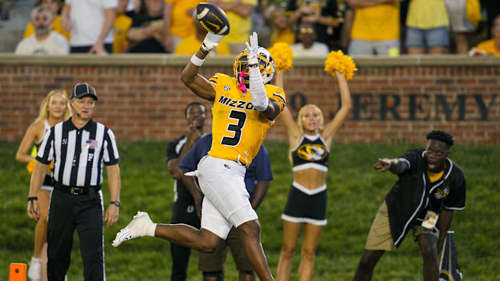 Sep 21, 2024; Columbia, Missouri, USA; Missouri Tigers wide receiver Luther Burden III (3) catches a touchdown pass during overtime against the Vanderbilt Commodores at Faurot Field at Memorial Stadium. Mandatory Credit: Jay Biggerstaff-Imagn Images