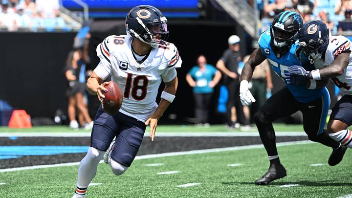 Caleb Williams rolls to throw against Carolina in Sunday's 59-37 Bears win. Caleb Williams rolls to throw against Carolina in Sunday's 59-37 Bears win.