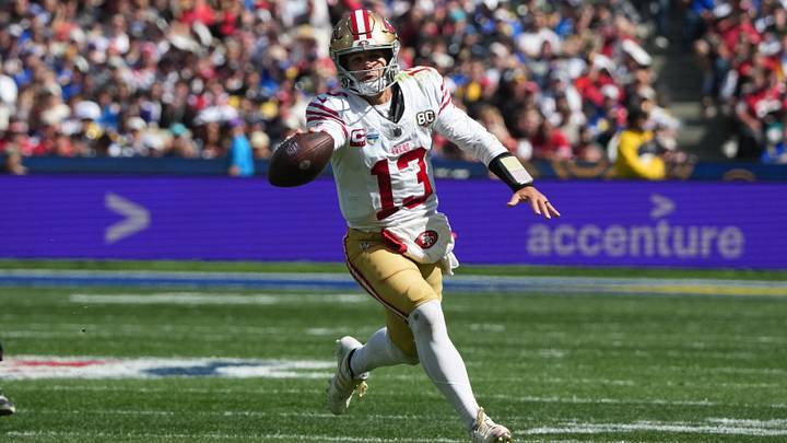 Sep 11, 2026; Melbourne, Victoria, Australia; San Francisco 49ers quarterback Brock Purdy (13) runs with the ball in the second half against the Los Angeles Rams during the 2026 NFL Melbourne Game at Melbourne Cricket Ground. Mandatory Credit: Kirby Lee-Imagn Images Sep 11, 2026; Melbourne, Victoria, Australia; San Francisco 49ers quarterback Brock Purdy (13) runs with the ball in the second half against the Los Angeles Rams during the 2026 NFL Melbourne Game at Melbourne Cricket Ground. Mandatory Credit: Kirby Lee-Imagn Images