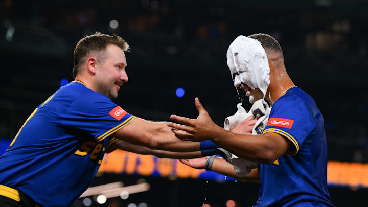 Sep 11, 2025; Seattle, Washington, USA; Seattle Mariners catcher Cal Raleigh (29) smears shaving cream on pinch hitter Harry Ford (5) after the Mariners defeated the Los Angeles Angels at T-Mobile Park. Mandatory Credit: Steven Bisig-Imagn Images